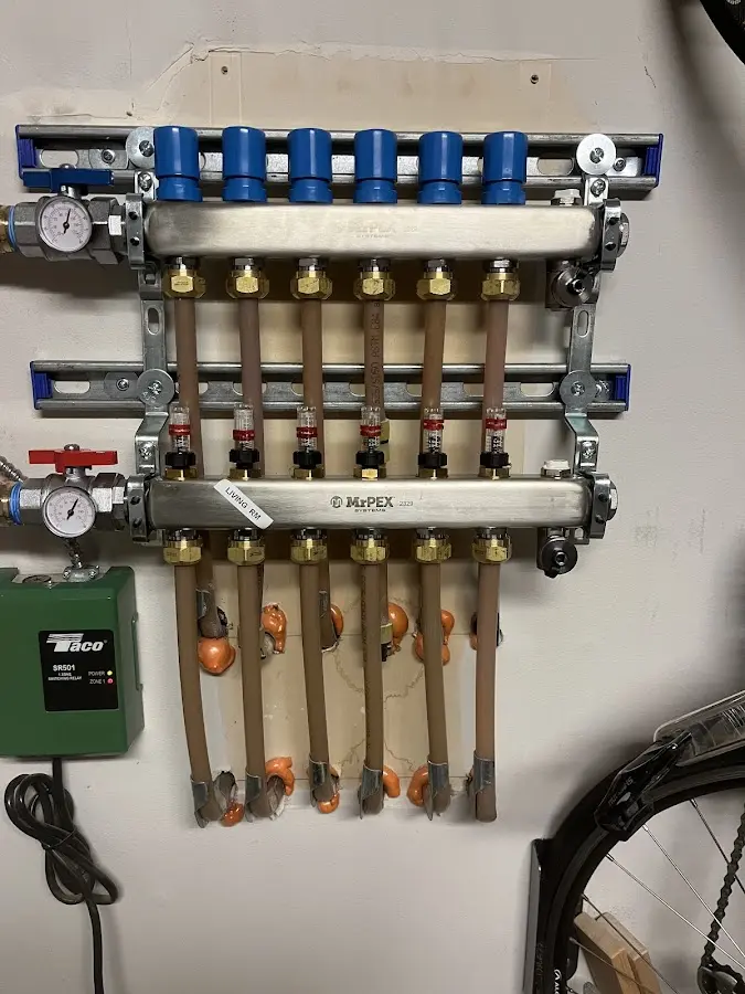 Plumber performing Water Heater Repair at a residential property in Wilkes-Barre